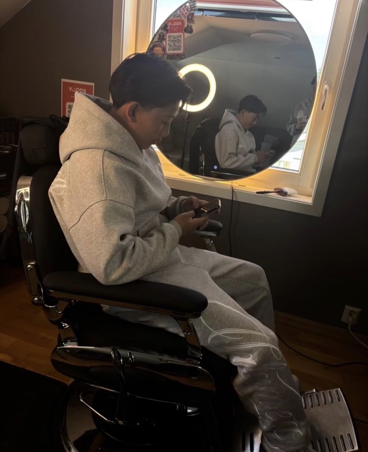 Austin Lucas Olivar in the barber chair